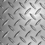 Closeup image of anti-slip textured checkered floor plate 