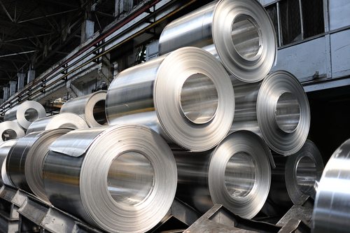 Rolls of aluminum sheet kept in a warehouse